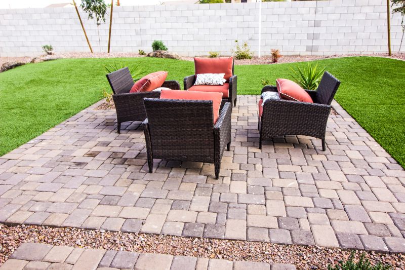 Outdoor paver space with seating area
